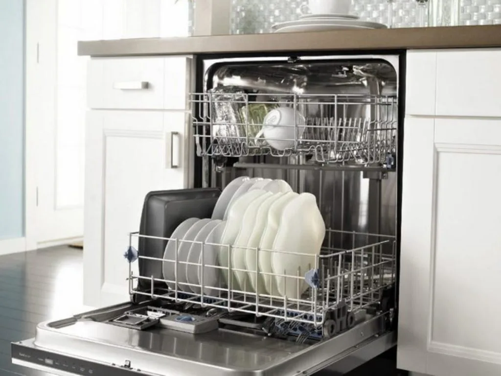 A dishwasher filled with clean dishes, ready to be unloaded and put away in the kitchen.